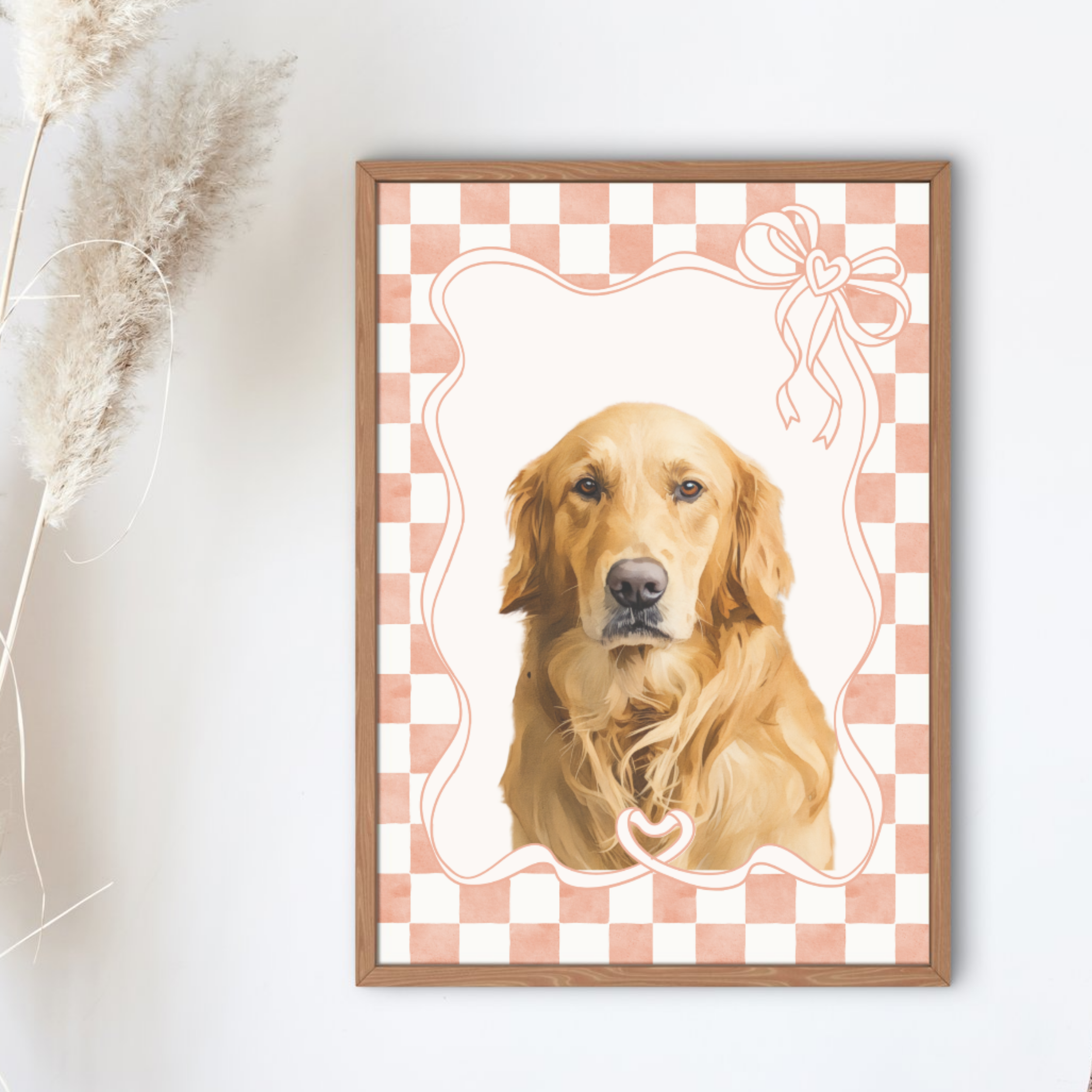 Framed portrait of a golden retriever with a checkered border on a white wall.