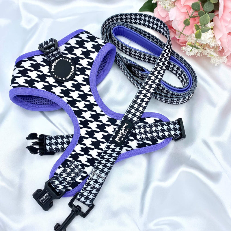 Fashionable no-pull dog harness showcasing a striking houndstooth pattern with purple details for a statement look