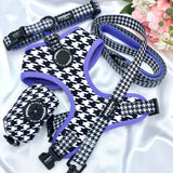 Designer dog leash with an eye-catching houndstooth design and purple accents, adding a touch of sophistication to your pet's accessories