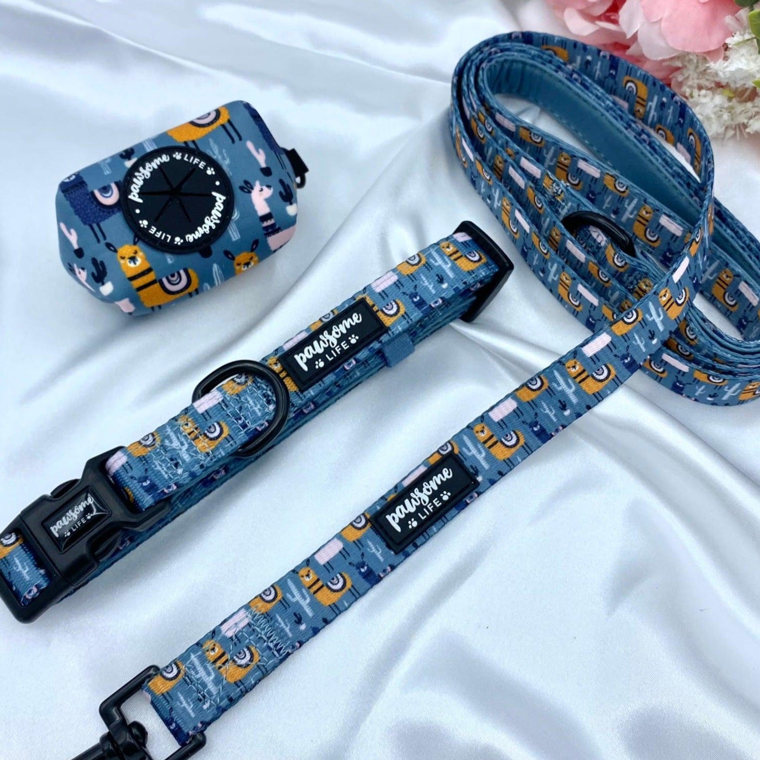Cute dog poop bag holder with a designer pattern for dog waste