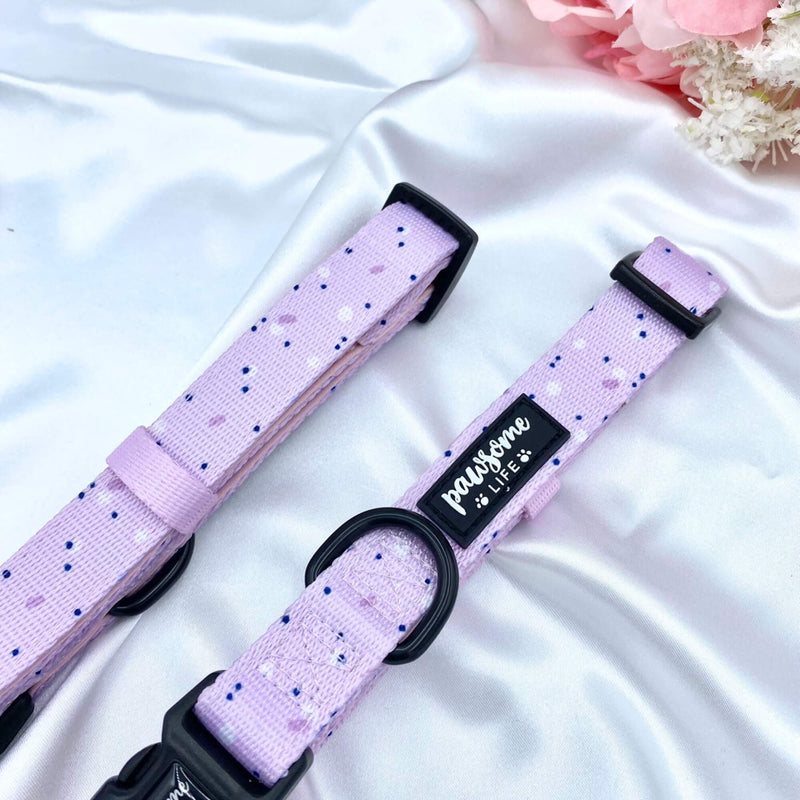 Cute dog collar with a pink, lilac, and purple design, adding a touch of style to your pet's wardrobe