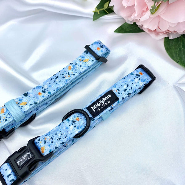 Cute dog collar with a trendy blue terrazzo design, adding a touch of charm to your pet's look