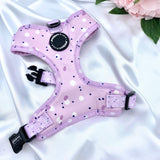 Stylish dog harness with a pink, lilac, and purple design, providing both comfort and style