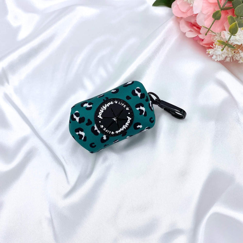 Cute dog poop bag holder featuring a green leopard design, perfect for stylish pet owners