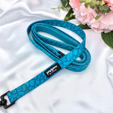 Cute dog leash adorned with a dark teal abstract design, perfect for stylish walks
