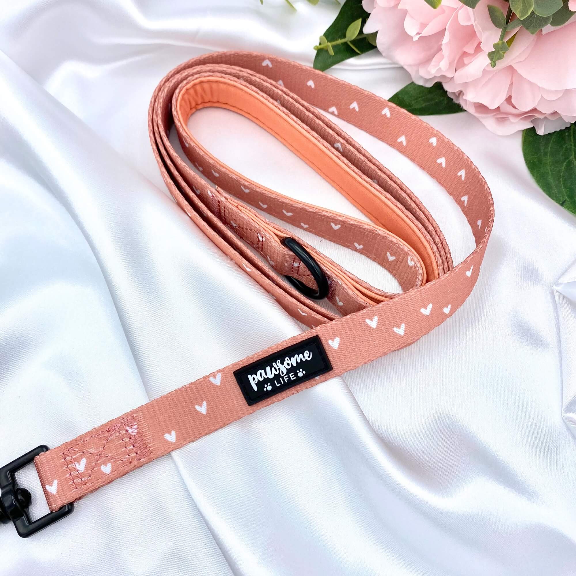 Cute dog leash adorned with a boho cinnamon-themed orange pattern with hearts, perfect for stylish walks