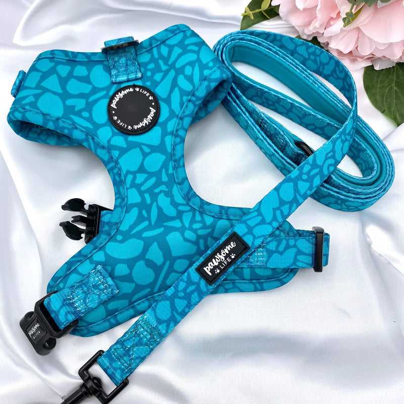 Functional and adjustable puppy harness with a dark teal abstract design, designed for a perfect fit and comfort