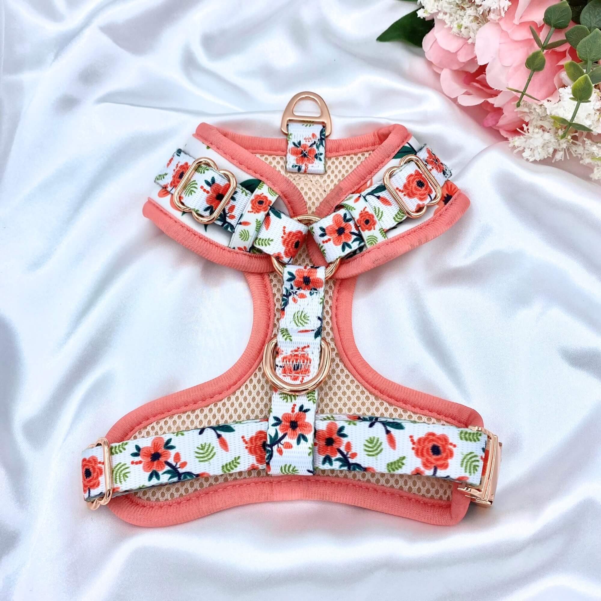 No-pull dog harness featuring a vibrant floral pattern, ideal for active pets