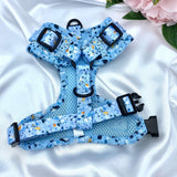 No-pull dog harness featuring a vibrant blue terrazzo pattern, ideal for active pets
