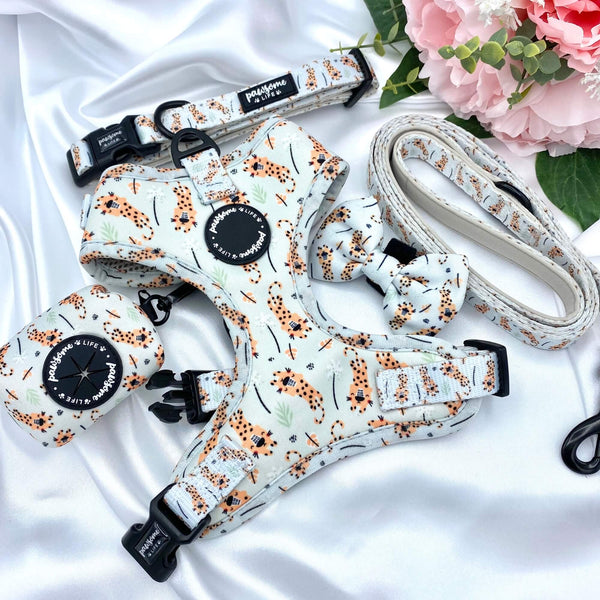 Designer dog bow tie with a unique tiger print and easy-to-attach velcro strap