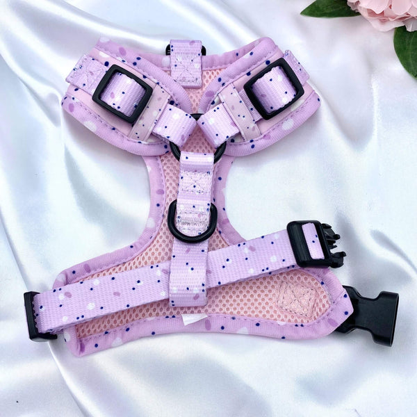 Trendy dog harness featuring a vibrant pink, lilac, and purple pattern, perfect for fashion-forward pups