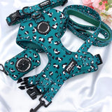 Adjustable dog collar adorned with a green leopard design, complete with a quick-release buckle
