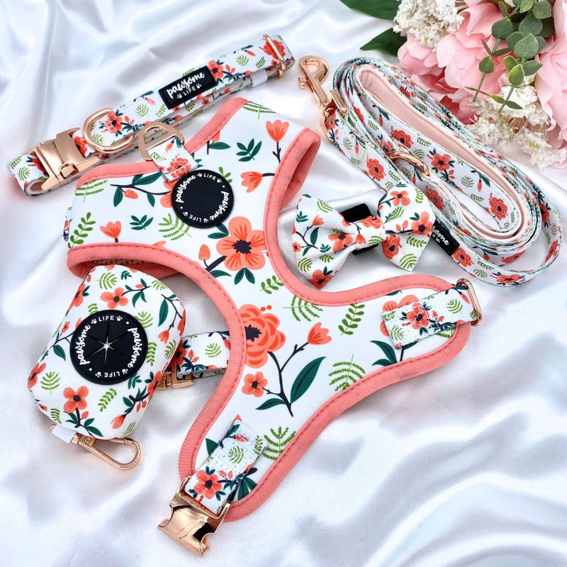 Adjustable dog harness adorned with a beautiful floral print, ensuring a comfortable fit
