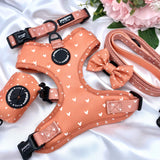 Stylish no-pull puppy harness with a unique boho cinnamon design and orange hearts, ideal for fashionable pets