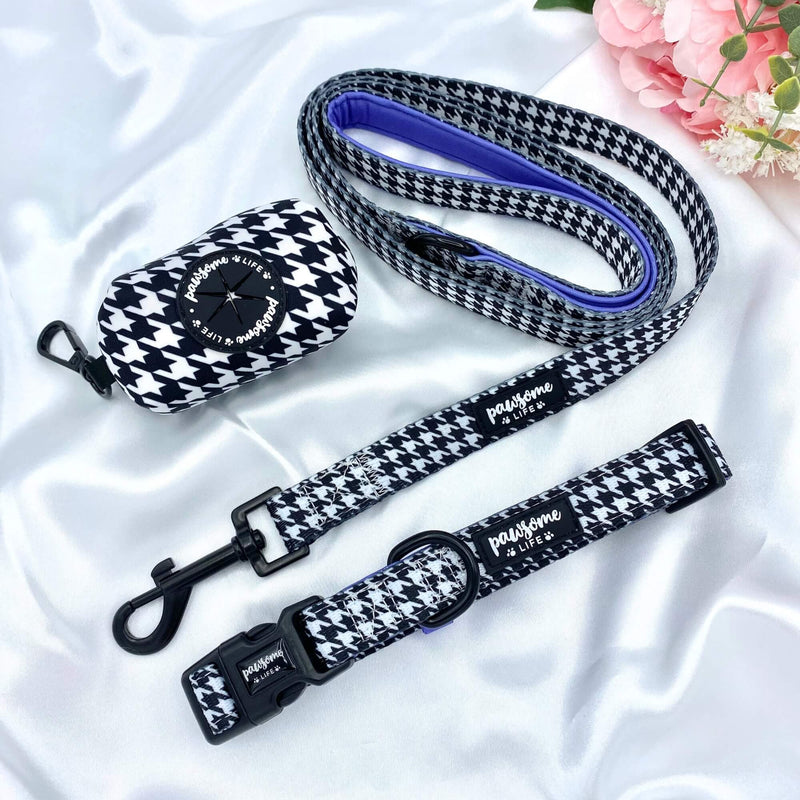 Elegant and adjustable boy dog collar boasting a bold houndstooth pattern, purple details, and a quick-release buckle for added convenience