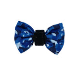 Designer dog bow tie with a unique blue camouflage print and easy-to-attach velcro strap