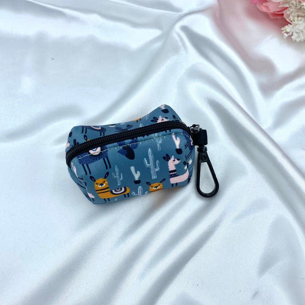 Cute dog poop bag holder with a designer pattern for dog waste